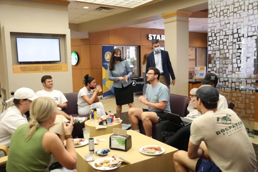 McQueen greets students in Bennett Campus Center