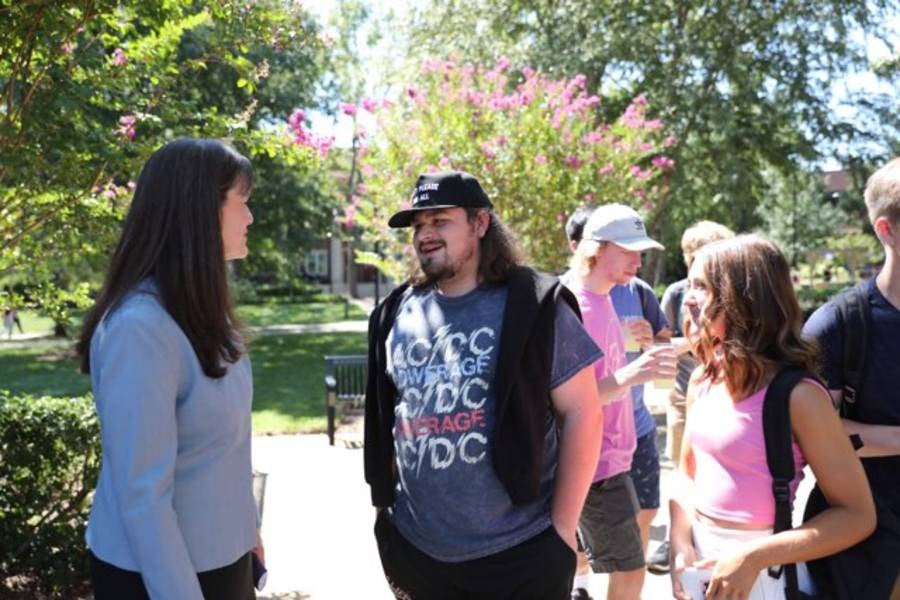 President McQueen talks with students in Bison Square