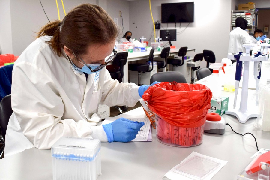 Lab worker in Aegis Labs