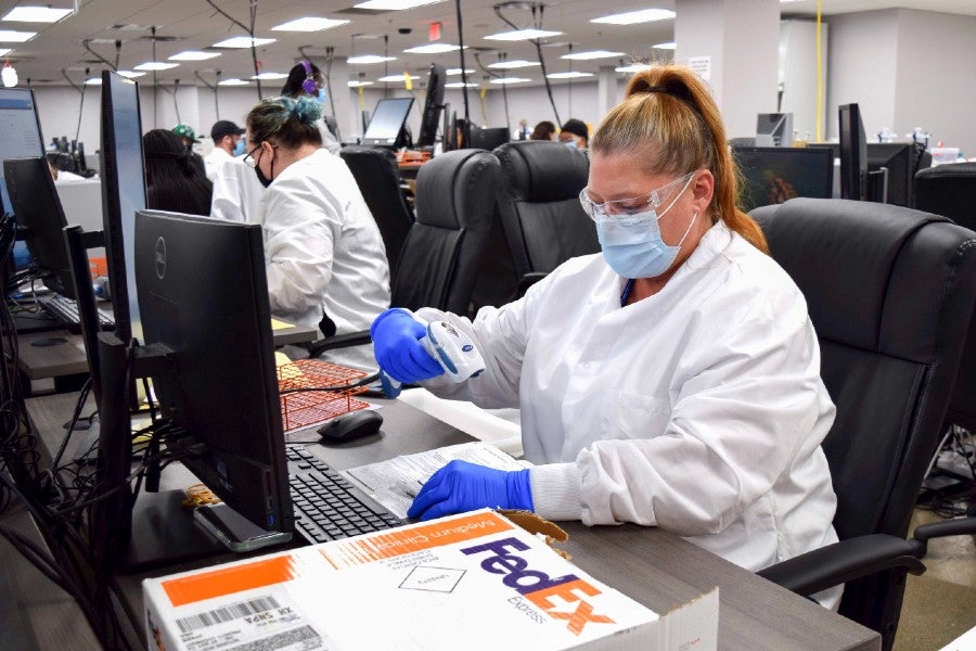 Lab worker in Aegis Labs