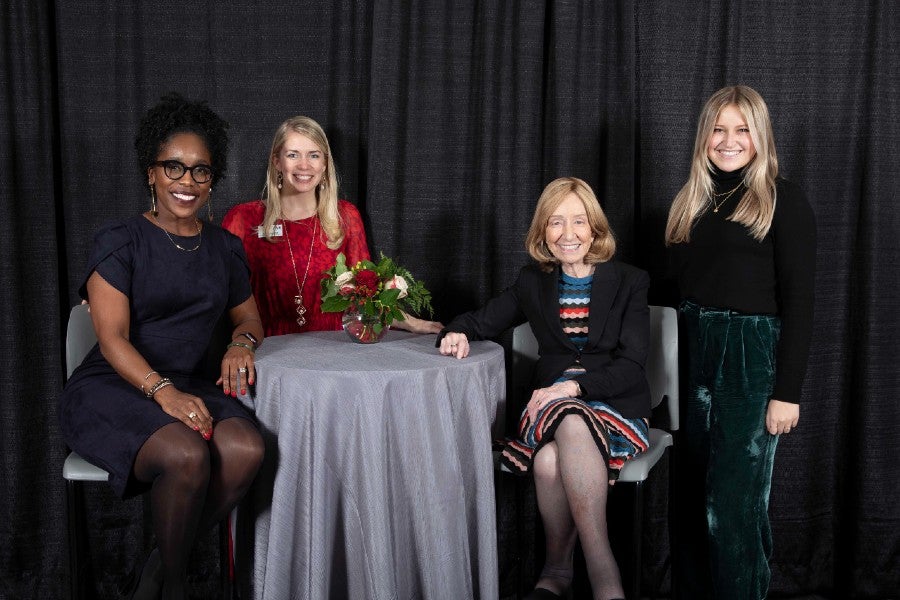 Goodwin posing with leadership college staff