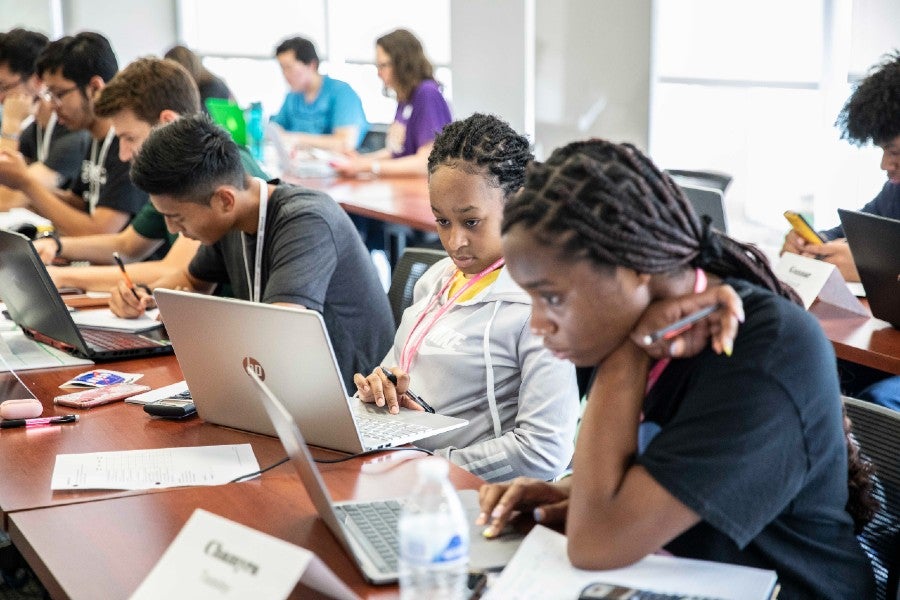 Students studying in the program