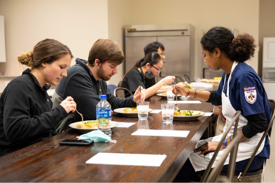 Health science students enjoying what they cooked