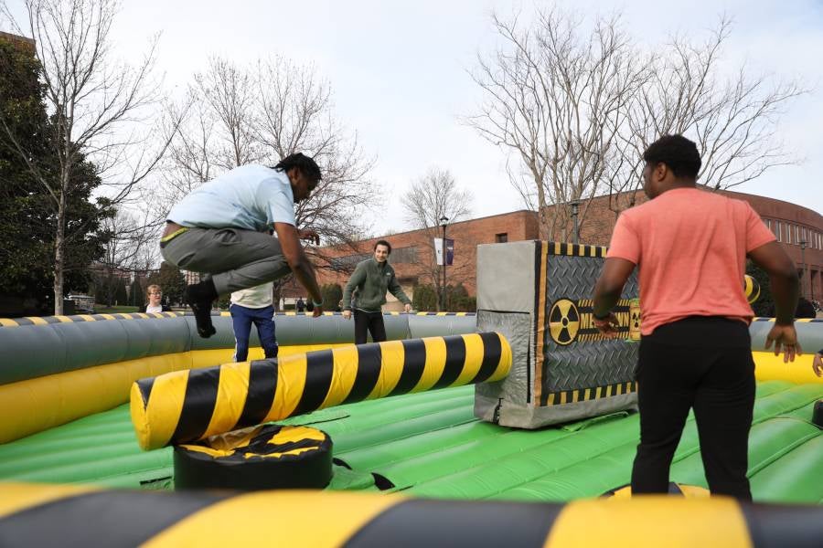 College students on an inflatable 