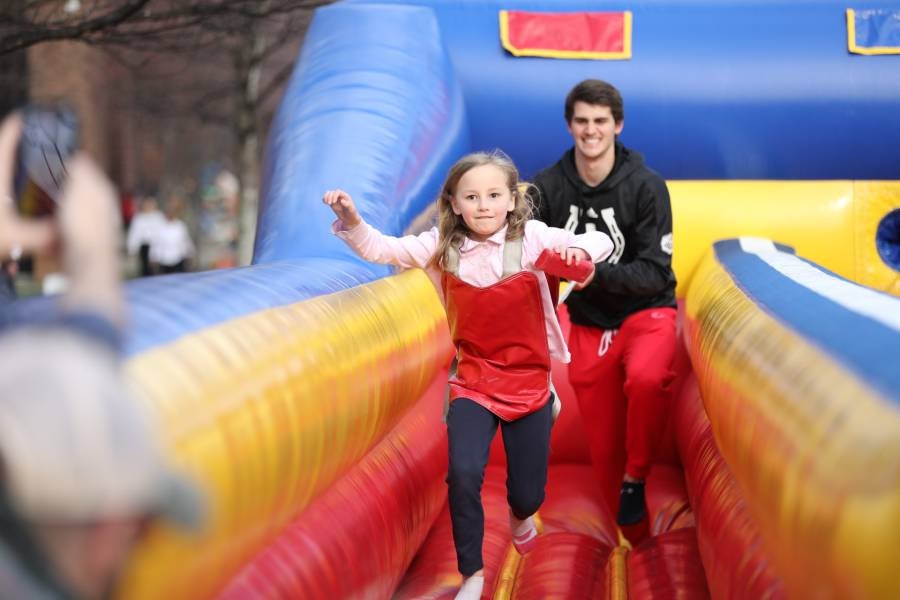 Kids on an inflatable slide