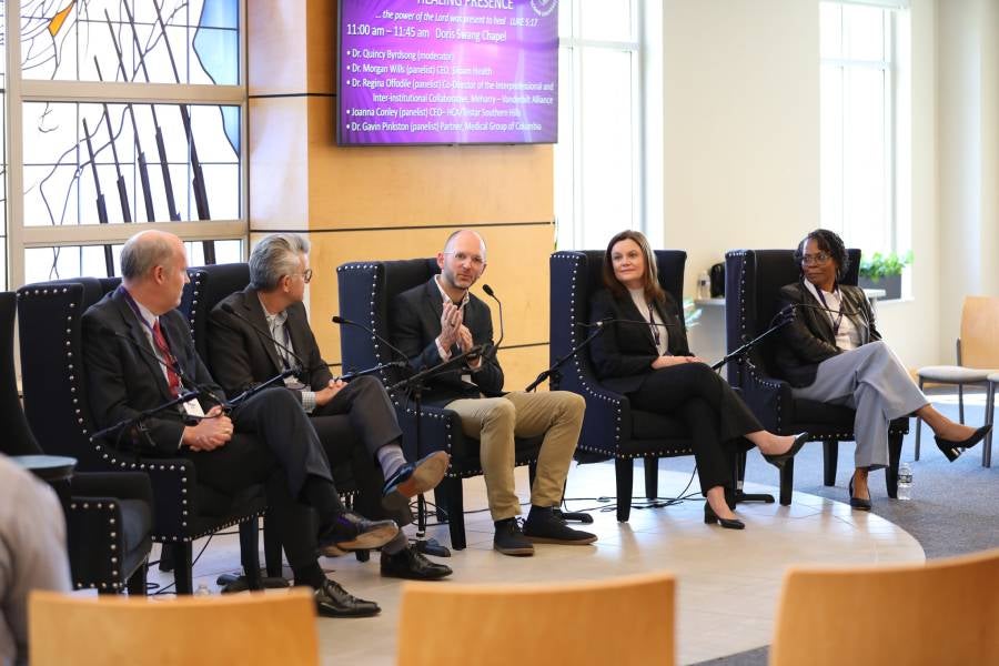 Panelists for the symposium on being a light in health care