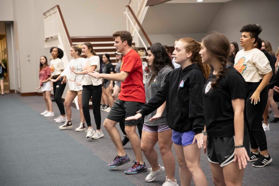 Students in Fairy Tale show rehearse