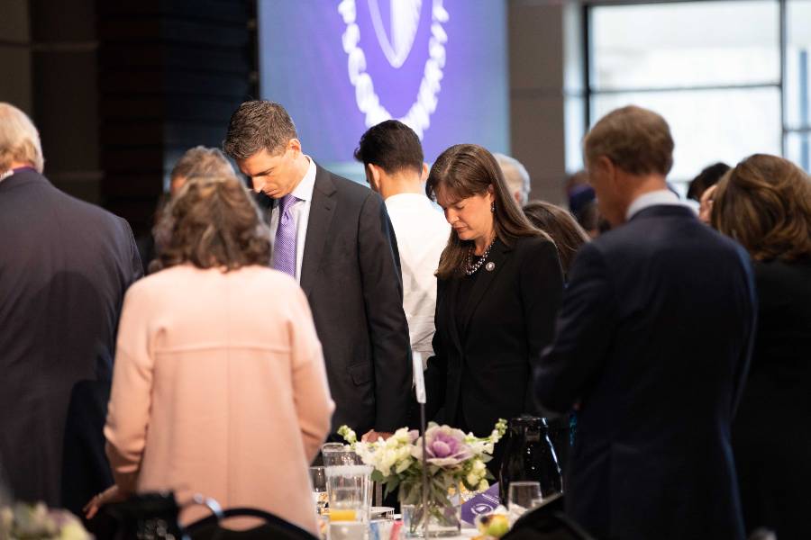 Andy and Candice McQueen in prayer