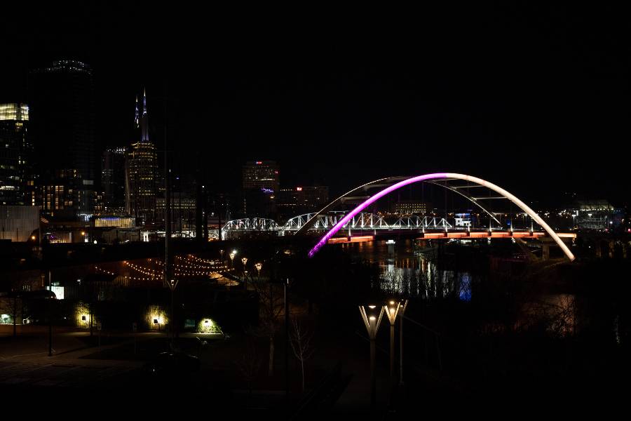 Korean Veterans Bridge lit in purple and gold. 