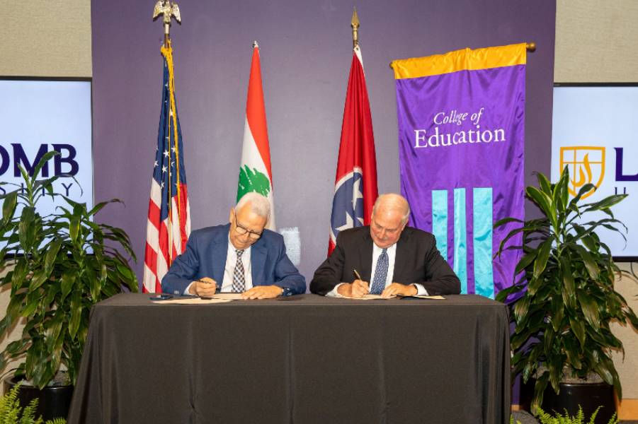 Provost Craig Bledsoe and Nabil Costa, CEO of LSESD, sign a partnership agreement