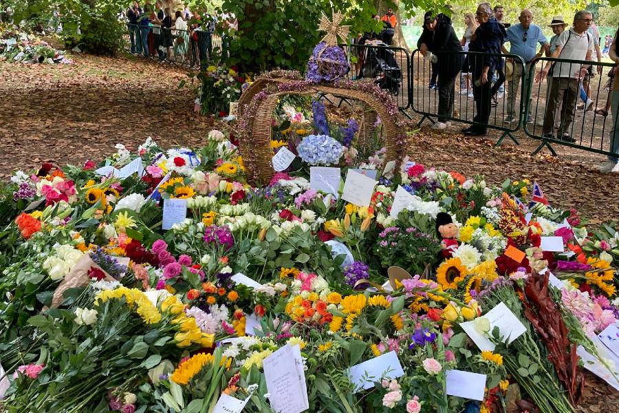 Mourners leave flowers at Green Park, the park near Buckingham Palace.