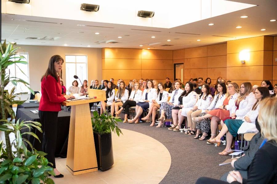 President McQueen speaking to the December nursing graduates.