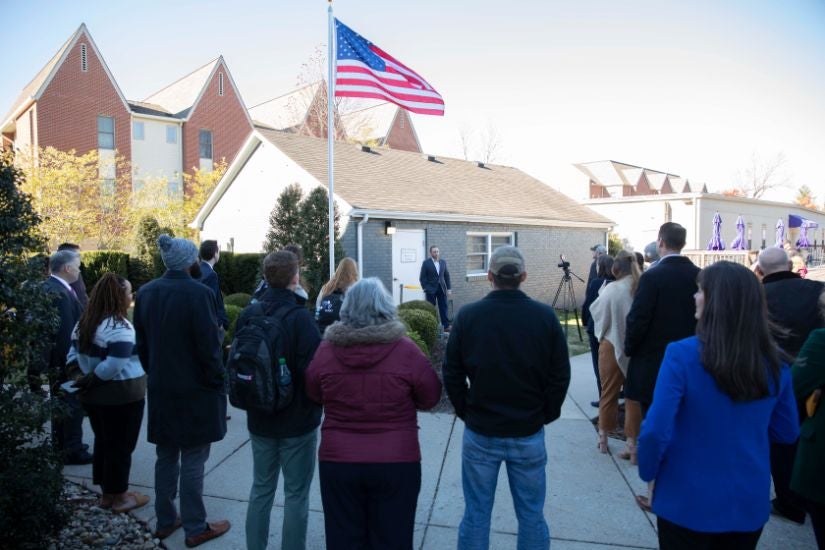 Outside building during the grand opening of the student veteran resource lounge