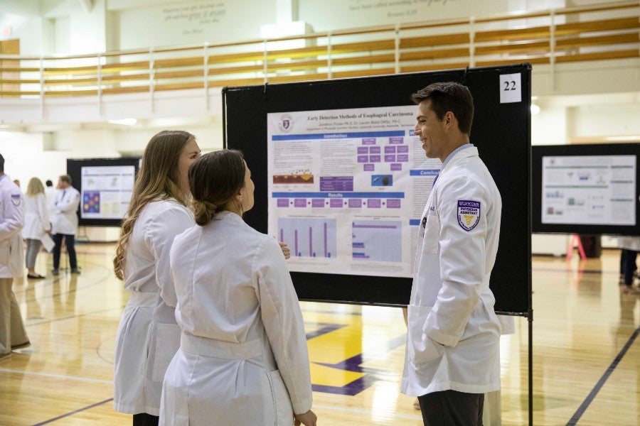 Presenting students and observers at the Scholar Day