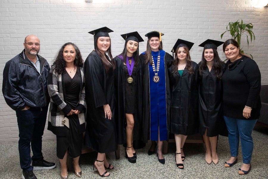 Lipscomb president Candice McQueen poses with first generation students and family members