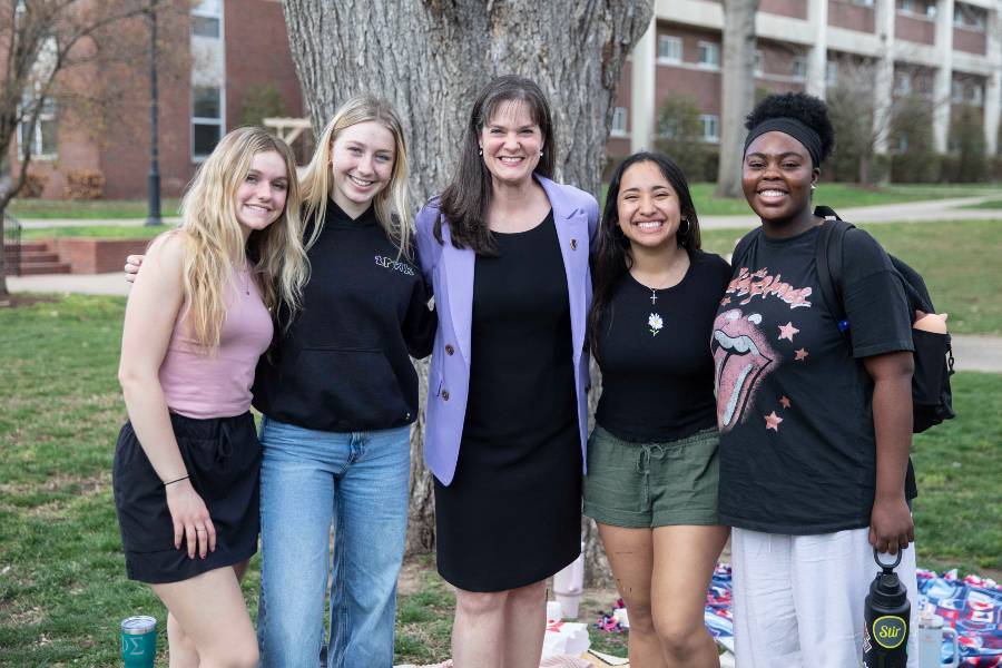 Students with Dr. McQueen in Bison Square