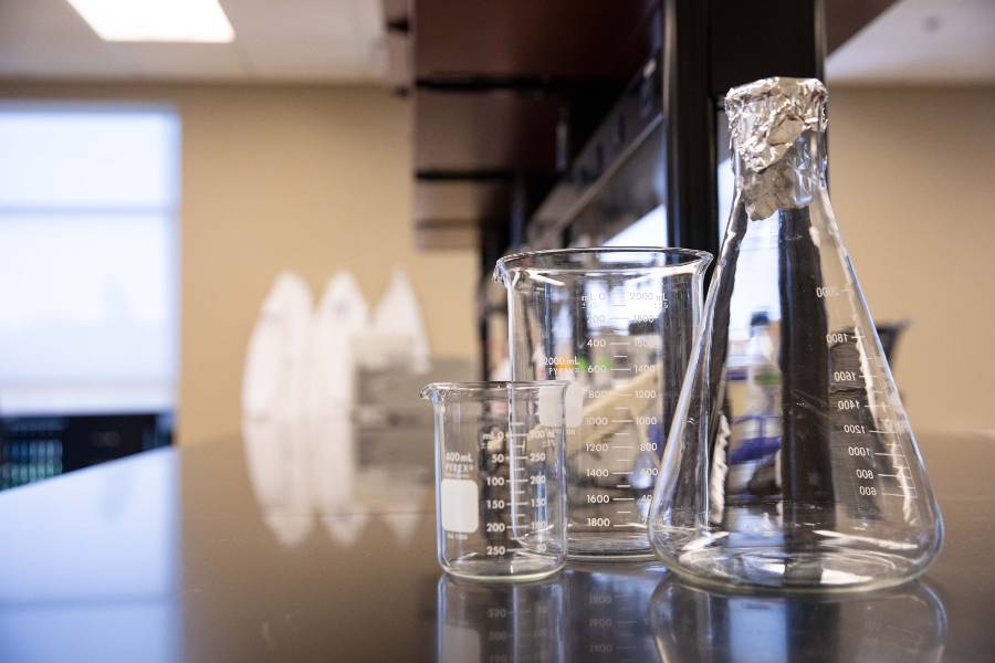 Beakers sitting on a lab table.