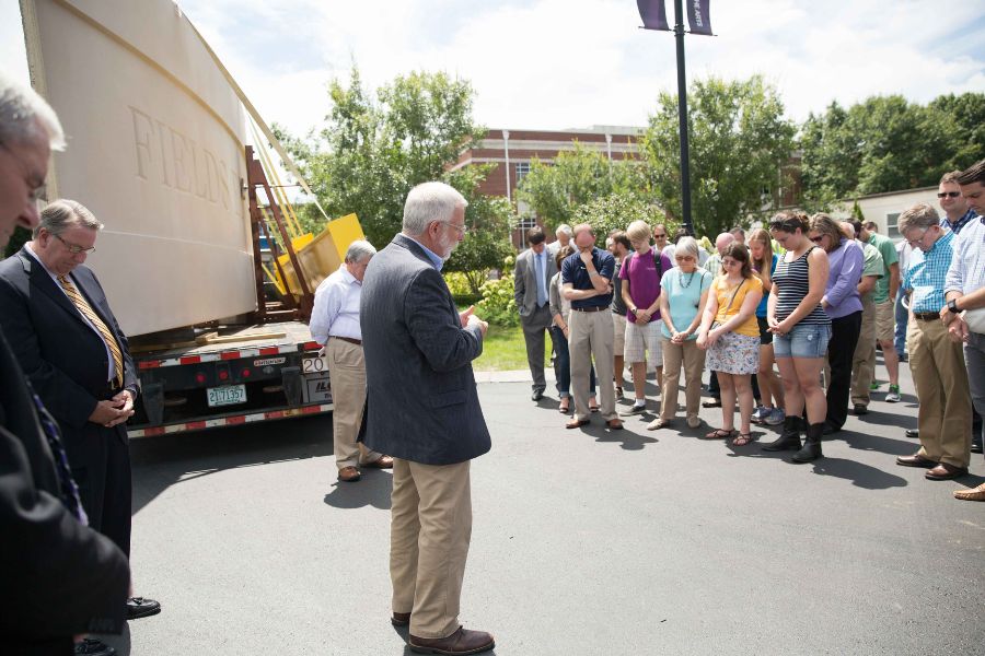 Fort Gwinn praying at the Fields Engineering Center topping out ceremony