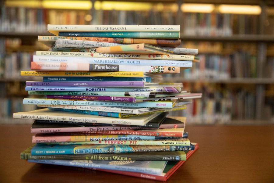 Stack of children's books used in Lipscomb's literacy curriculum