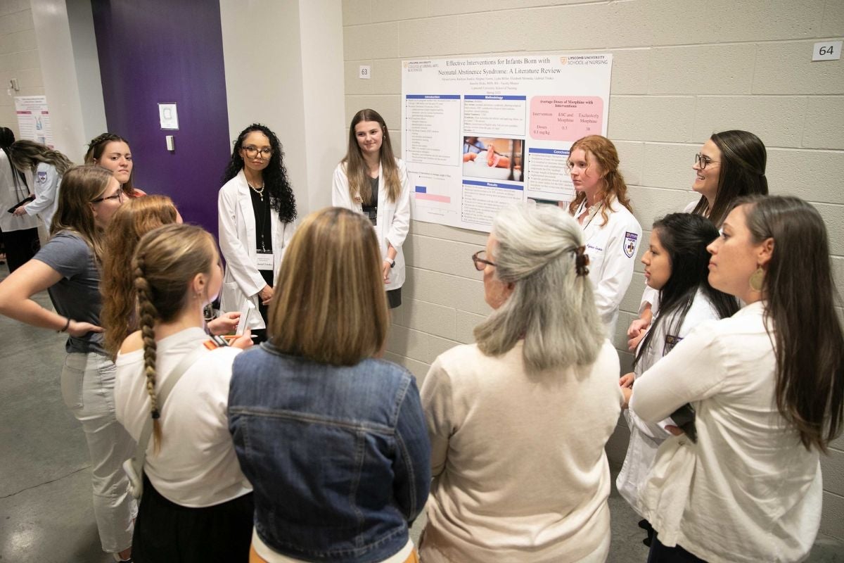 Student discussing their project at the Student Scholars Symposium