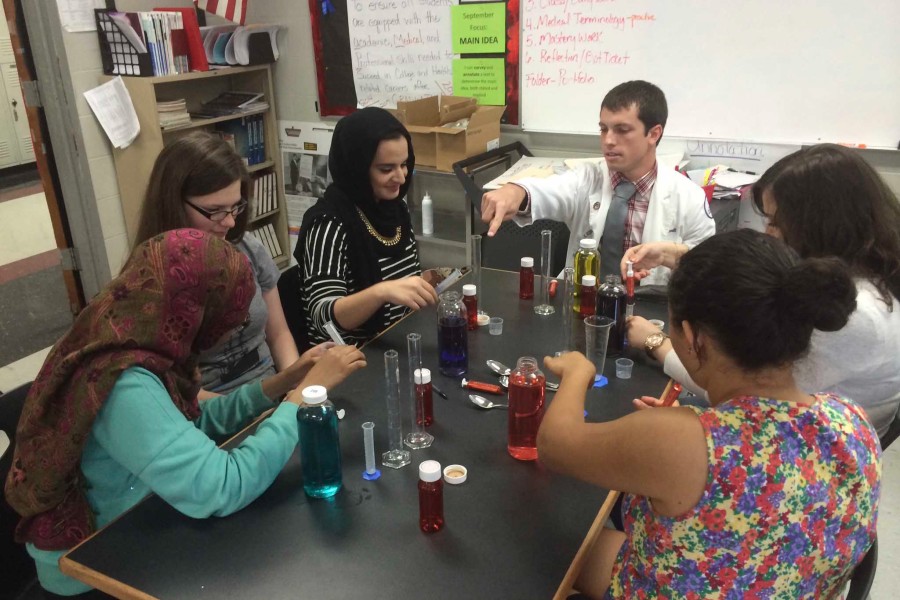 Muna Said and classmates being taught by a Lipscomb student in 2015