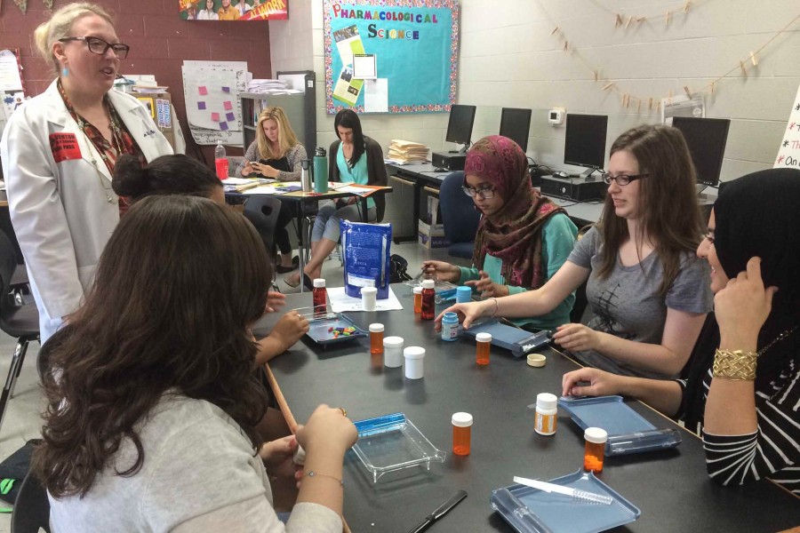 Muna Said and her classmates in 2015 learning a new skill from a Lipscomb professor