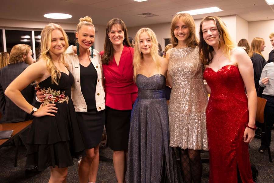 President McQueen and Students at the Halston Gala in their Black Tie Attire