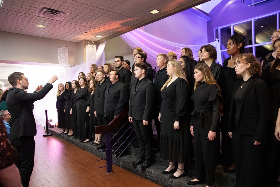 The student ensemble Chorale performs a the opening