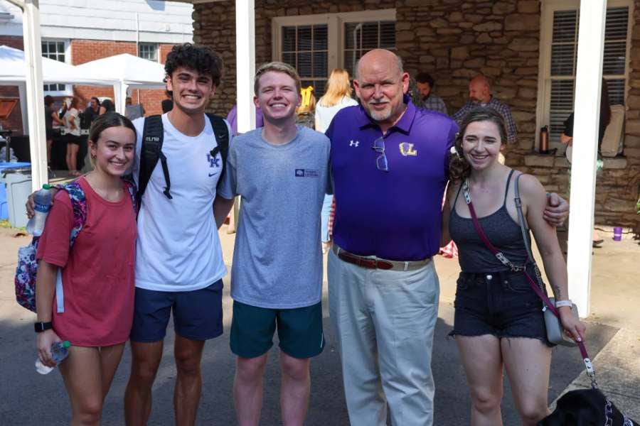 group of CEI students with professor