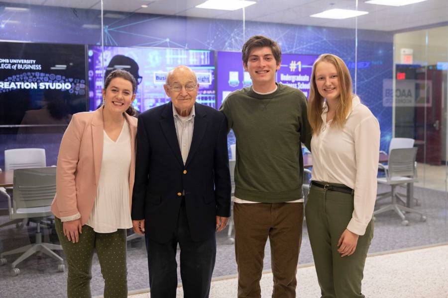 students and professor at the Kittrell Pitch Competition