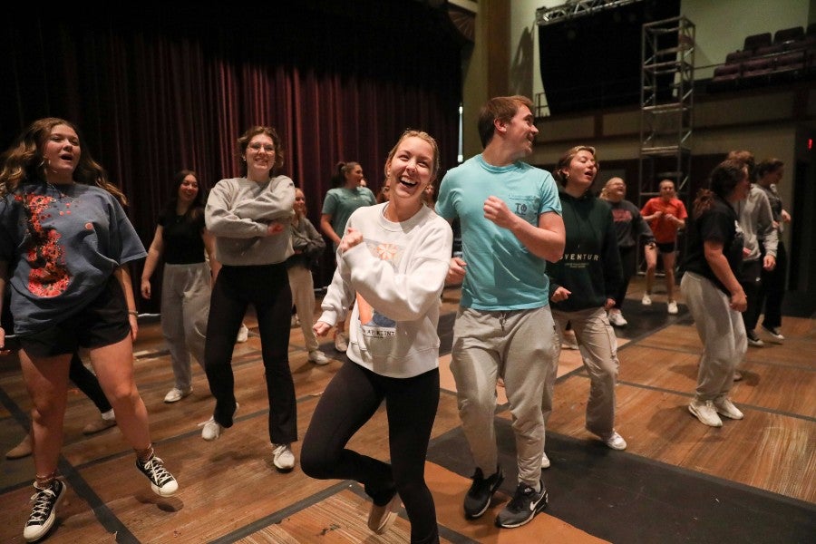 Today's students rehearse the 1980s themed show for Singarama 2024.