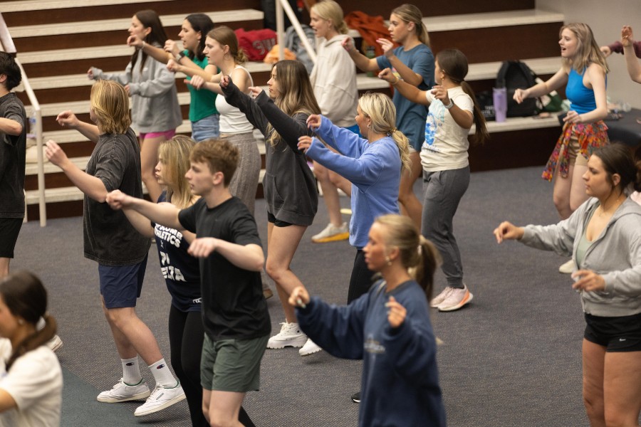 Today's students rehearse the 1990s themed show for Singarama 2024.