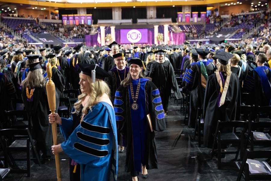 President McQueen at commencement recessional.