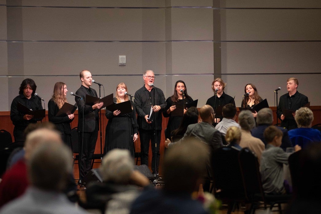 Sactuary student singers lead worship songs at luncheon