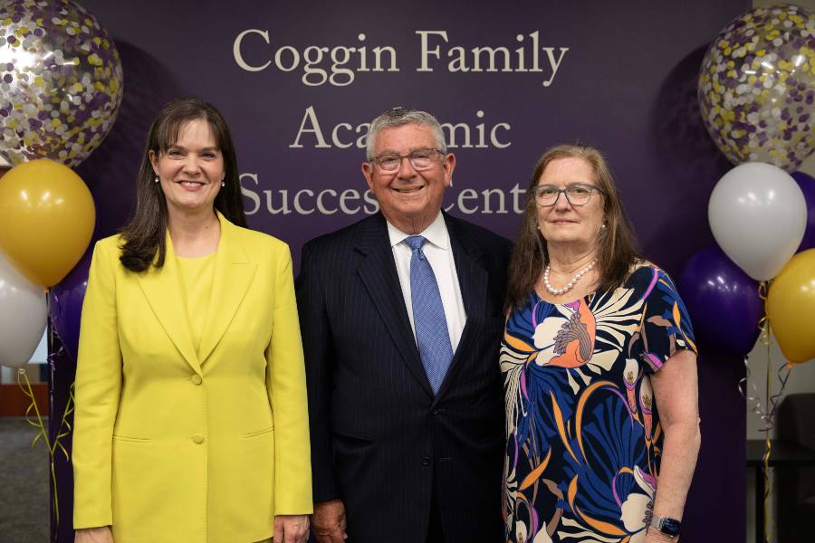 President Candice McQueen with Gerald and Joanne Coggin. 