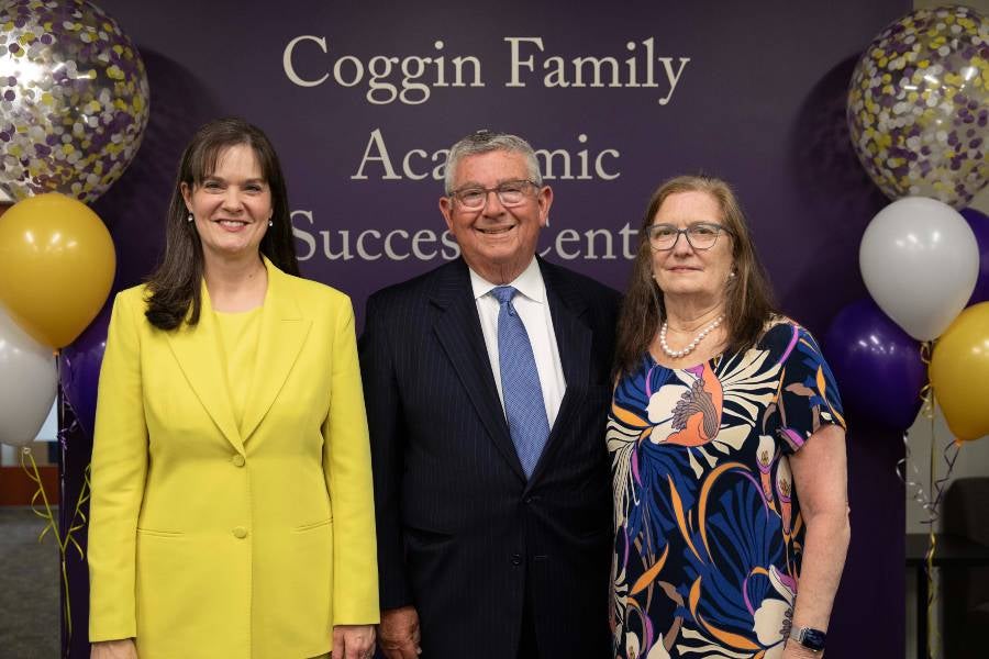 President Candice McQueen with Gerald and Joanne Coggin. 