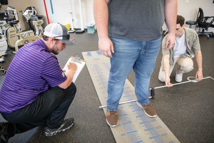 Students conducting research in kinesiology program.