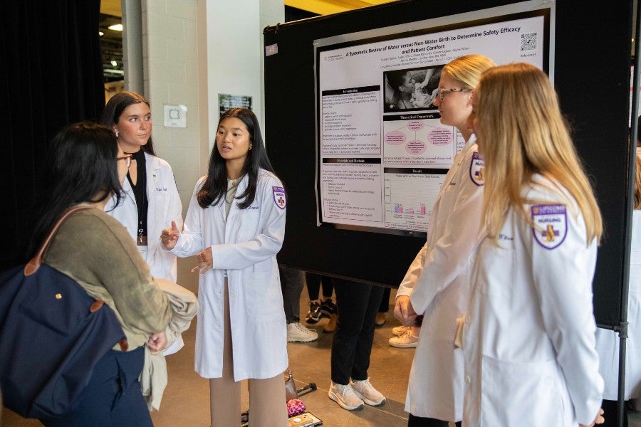 Students in the Nursing Research Class presenting research at Symposium