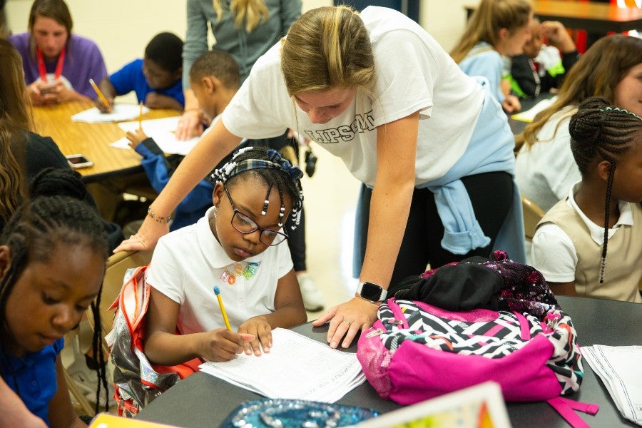 Student athletes tutoring at Carter-Lawrence Elementary School