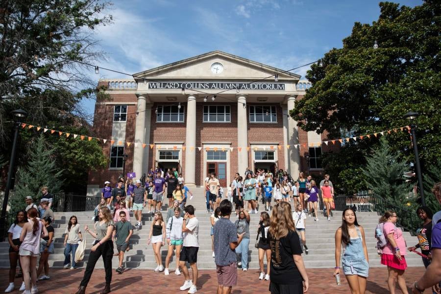 Bison Square filled with students on a sunny day.