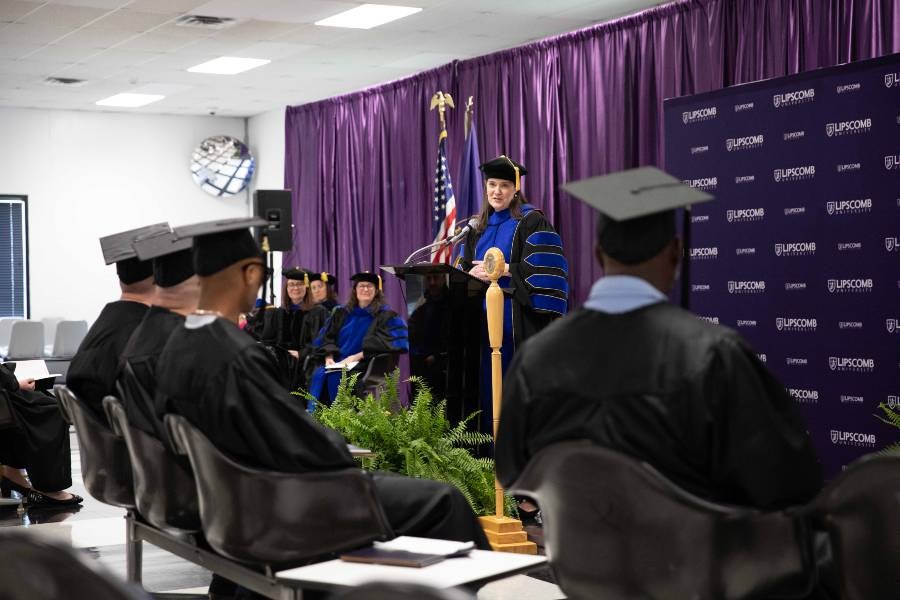 President Candice McQueen speaks to graduates at the spring ceremony at Riverbend Maximum Security Institute.
