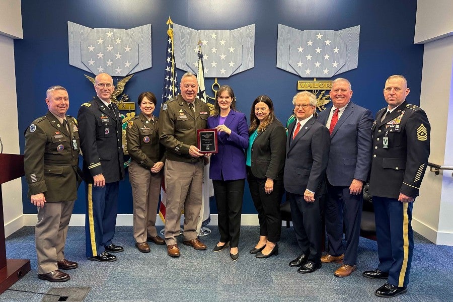 Lipscomb President Candice McQueen along with others from Lipscomb receive the Army Partnership Award at the Pentagon.