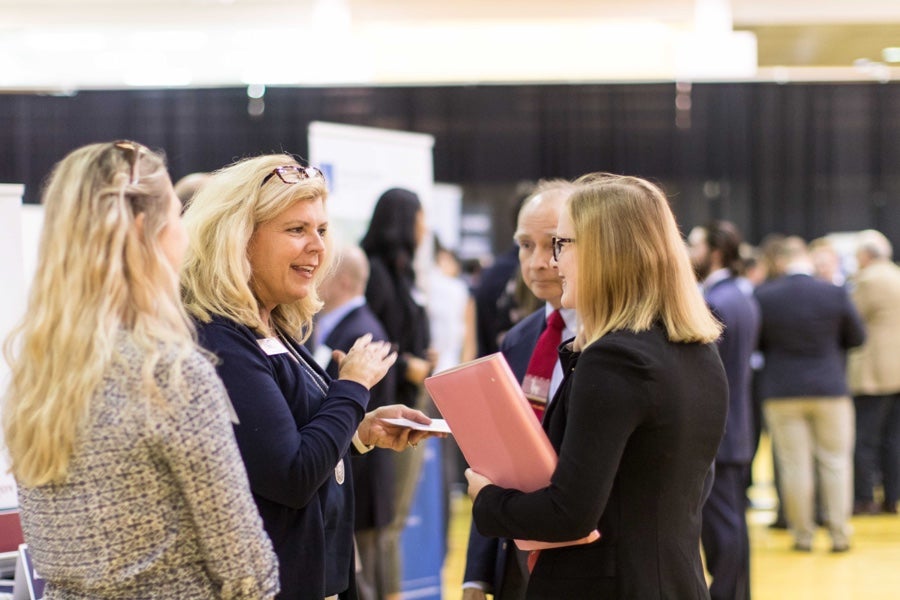 Students meeting representatives of local firms