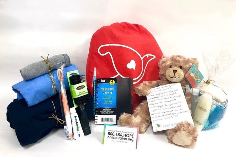 After care kit with items including teddu bear, tooth brush and other items.