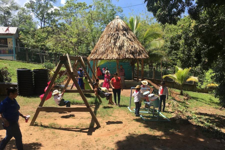 Children on a playground in Honduras