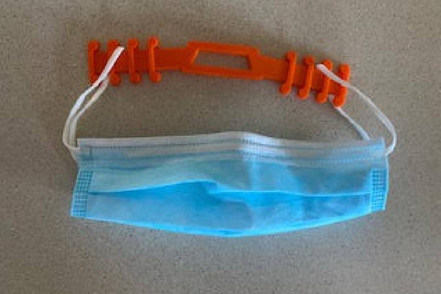 Photo of face mask with ear saver. 