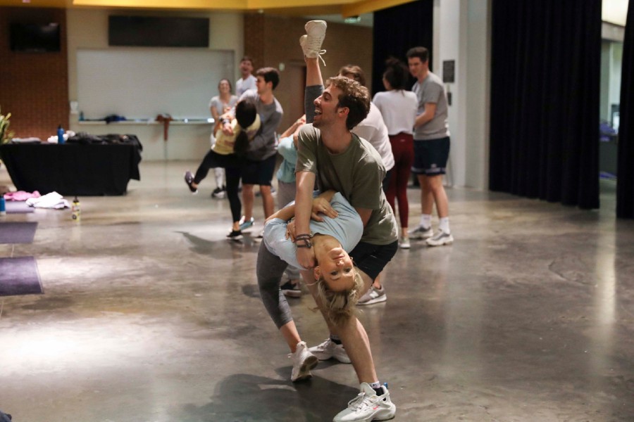 A male student dipping a female student during a number in Singarama rehearsal.