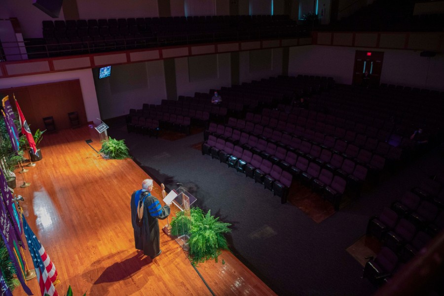 Lipscomb provost at graduation taping in empty Collins Auditorium
