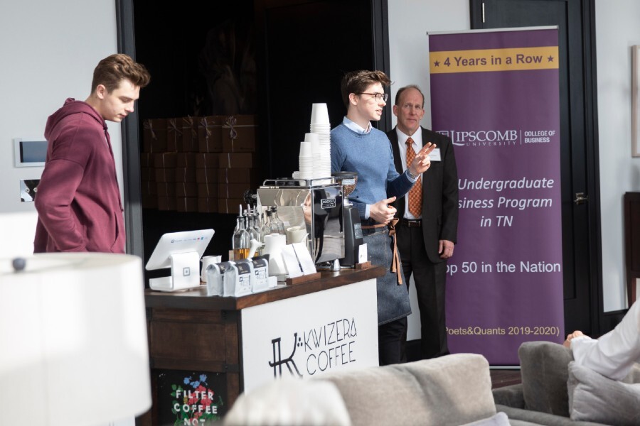 Aidan Miller with his coffee cart at an event