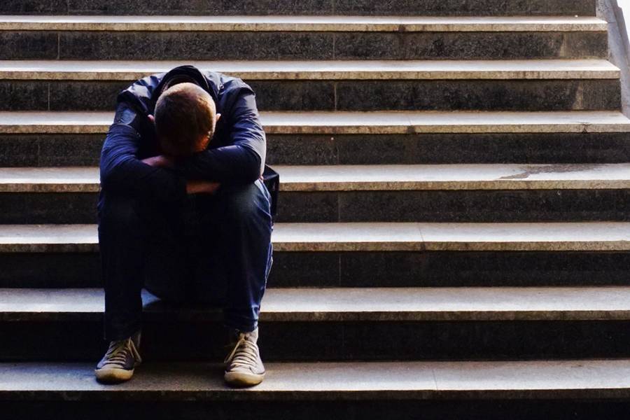 Person sitting on steps